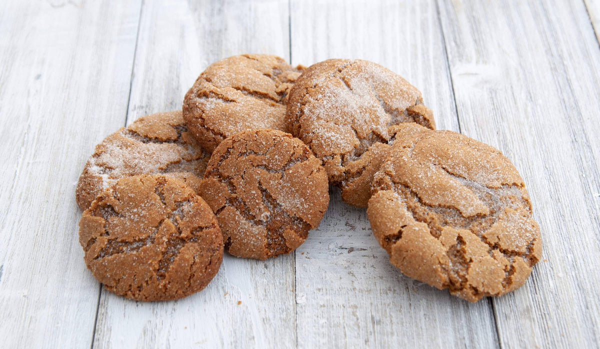 Cookies with a crinkled texture on a wooden surface