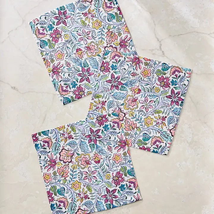 Set of three Geometry dishcloth towels with floral pattern on a white background
