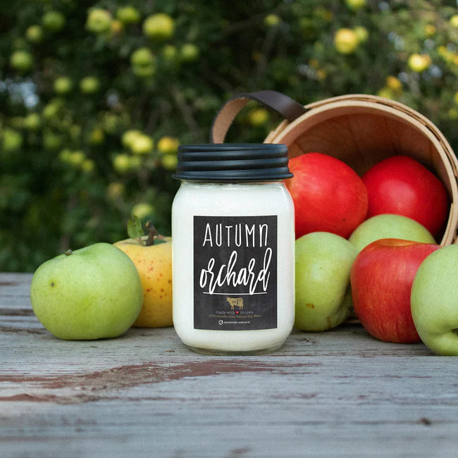 Jar labeled 'Autumn Orchard' with apples in the background