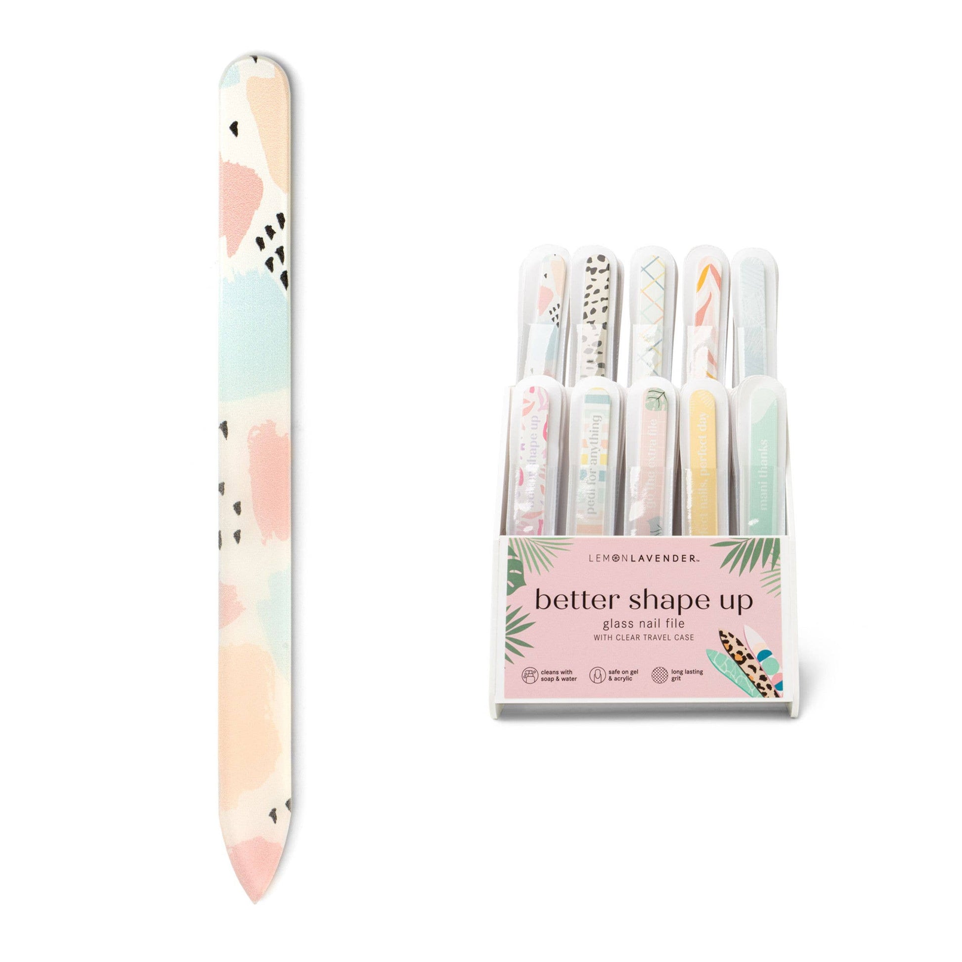 Set of glass nail files with a floral design in a clear packaging on a white background