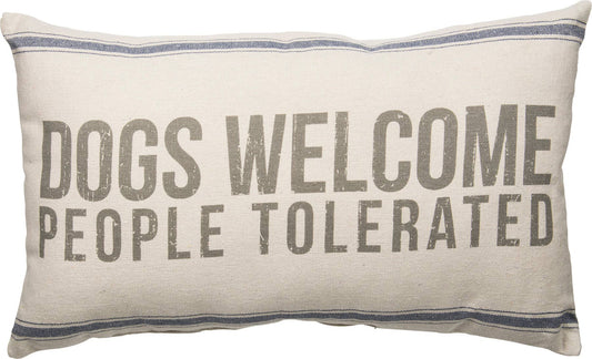 Decorative pillow with text 'DOGS WELCOME PEOPLE TOLERATED' on a white background