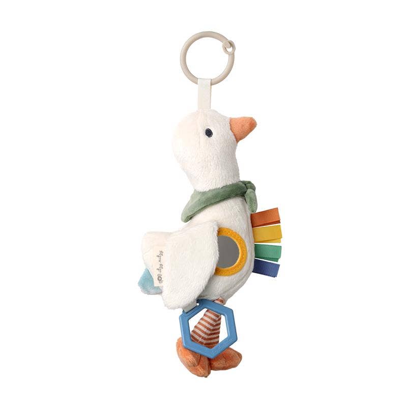 Plush toy goose with colorful elements on a white background