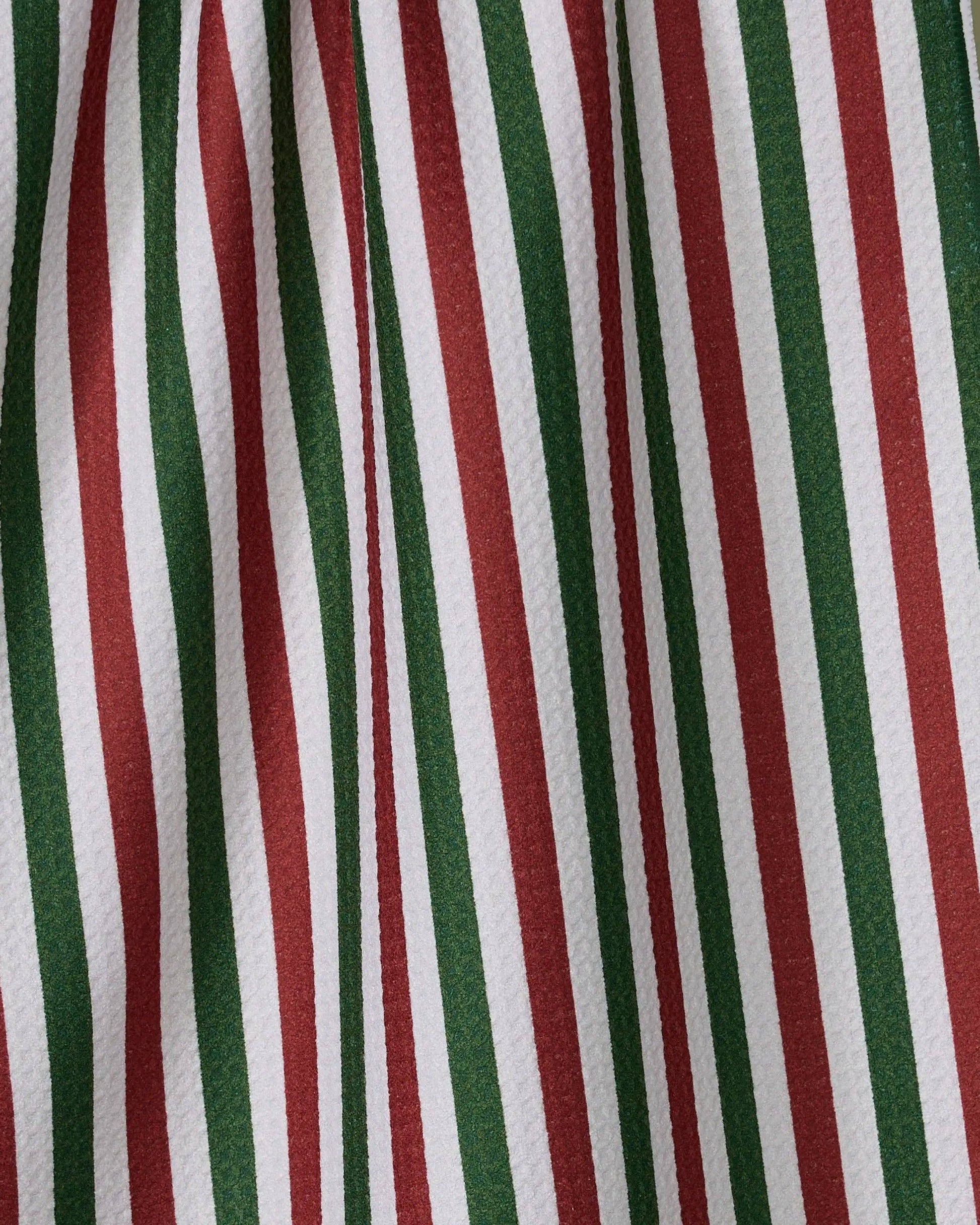 Geometry Tea Towel Ribbon Green Red  Close-up of fabric with red, green, and white vertical stripes.