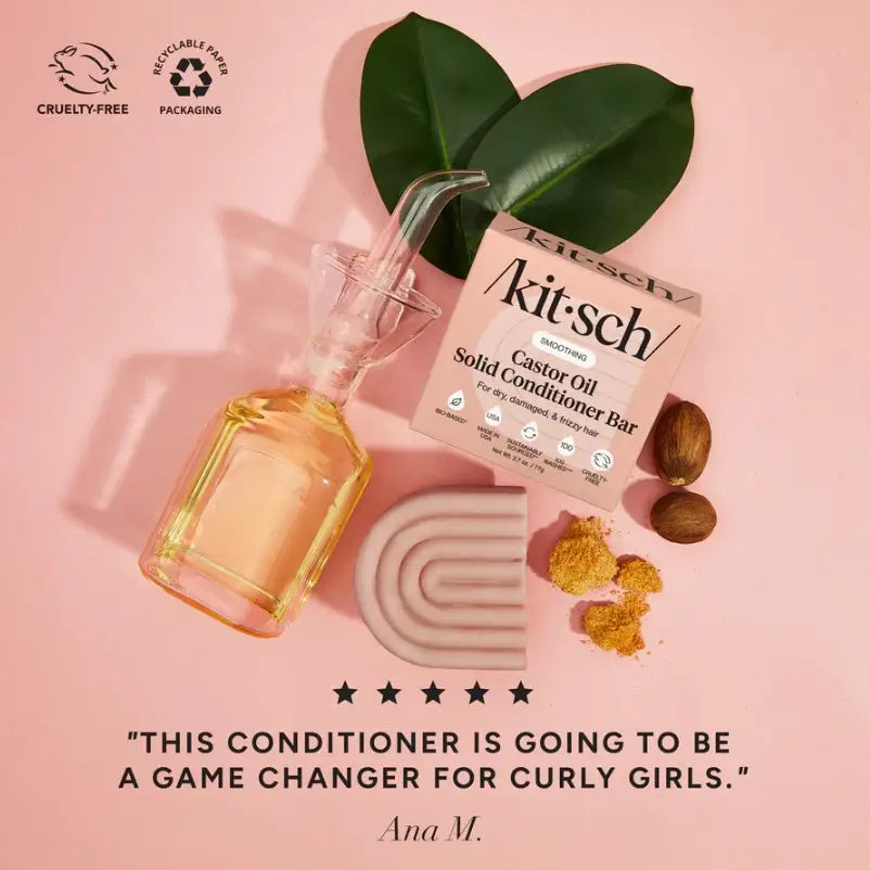 Kit'sch Castor Oil Solid Conditioner Bar with packaging on a pink background