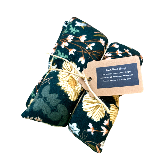 Floral patterned rice neck wrap with a tag on a white background