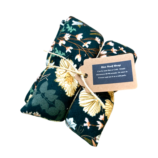 Floral patterned rice neck wrap with a tag on a white background
