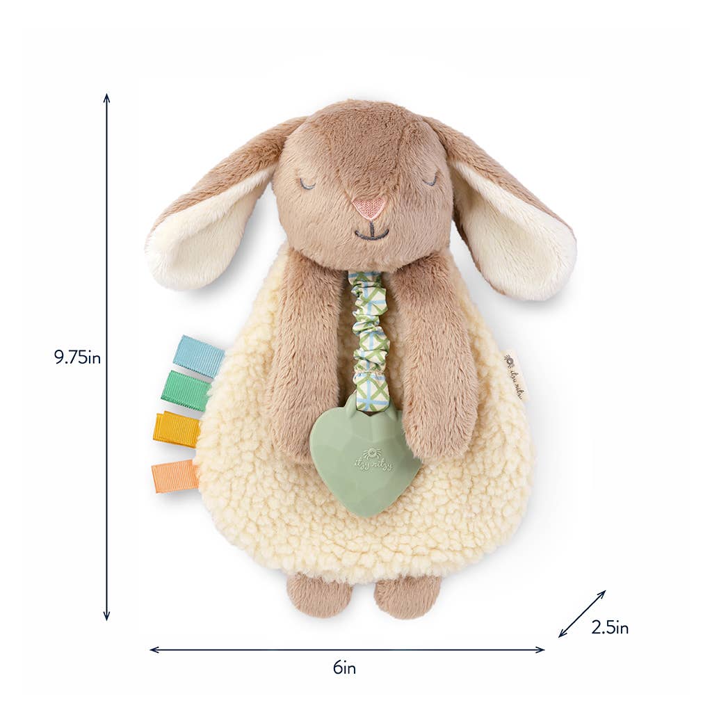 Plush toy rabbit with a rattle and heart-shaped tag, shown with measurements on a white background.
