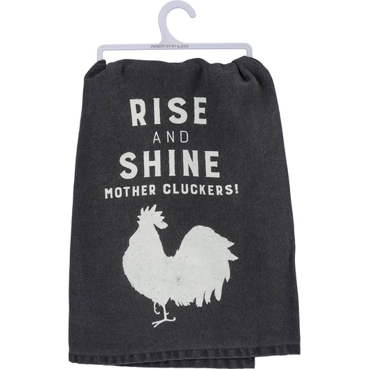 Black towel with white text and rooster graphic on a hanger