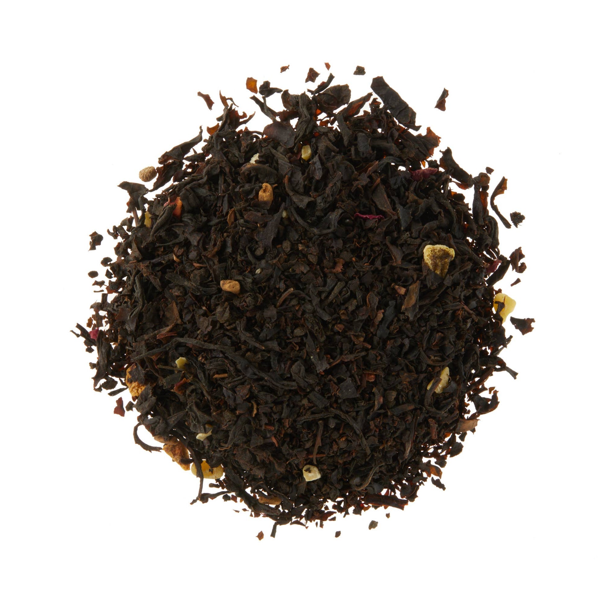 Dry black tea leaves on a white background