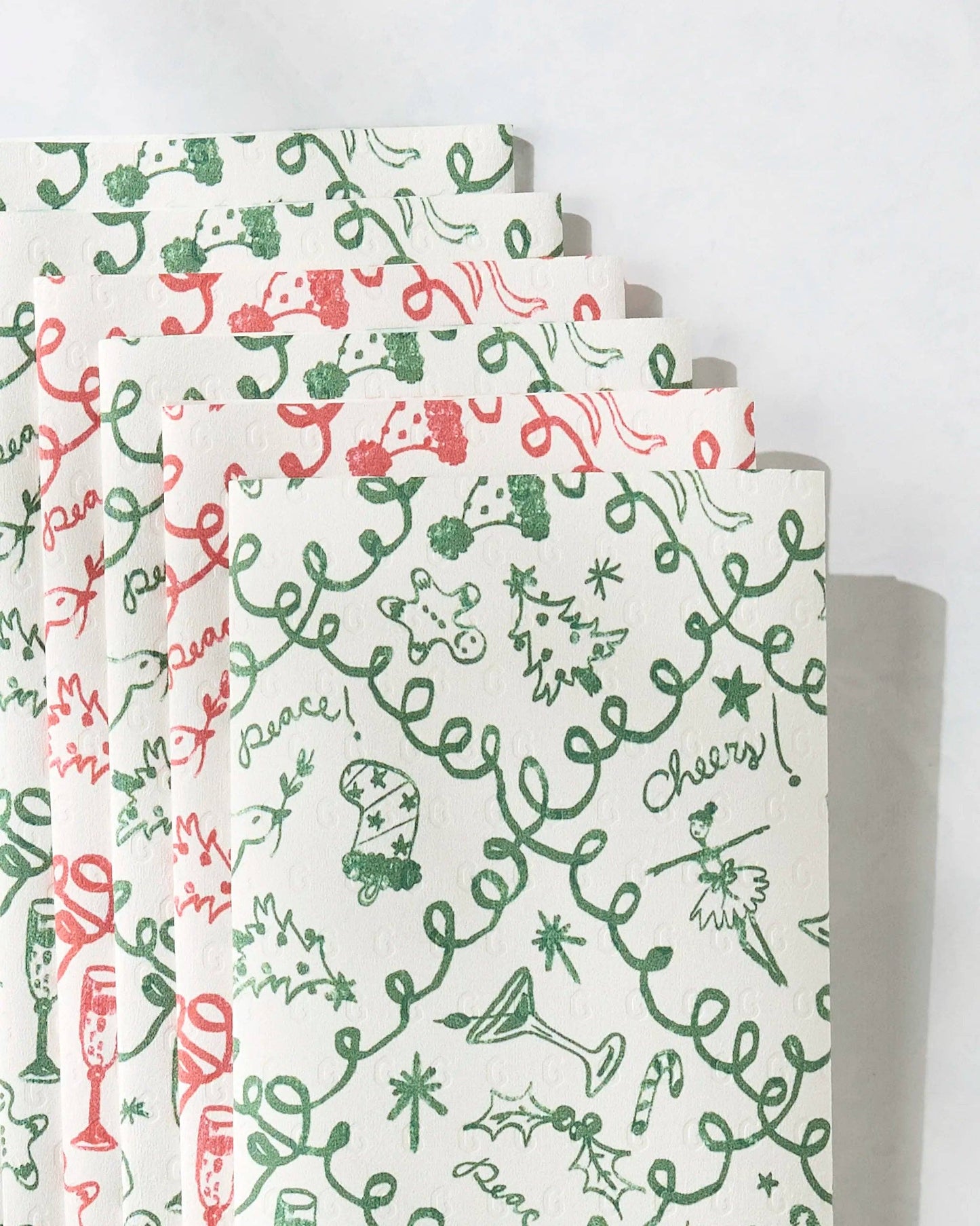 Set of three patterned Geometry Not Paper Towels stacked on a white background