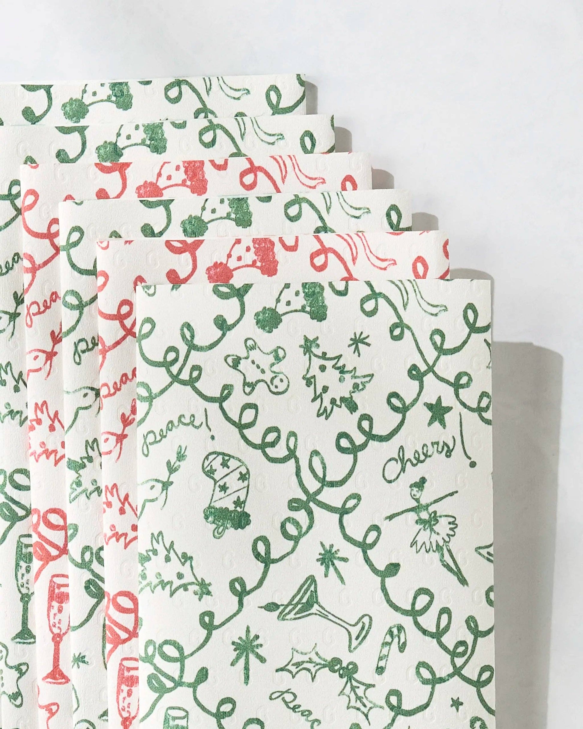 Set of three patterned Geometry Not Paper Towels stacked on a white background