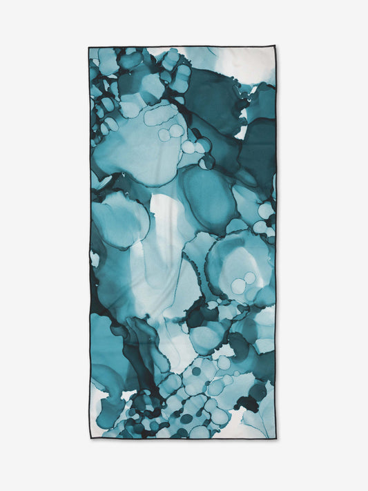 Beach Towel with blue and green abstract pattern on a white background