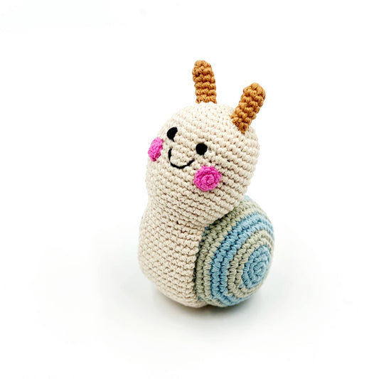 Crocheted snail toy with a white background