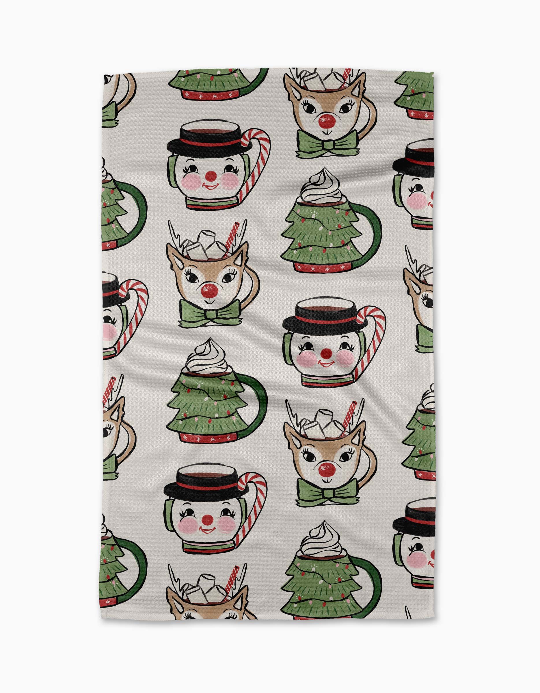 Geometry Tea Towel Patterned fabric with Christmas-themed designs including reindeer, hot chocolate cups, and candy canes on a white background.