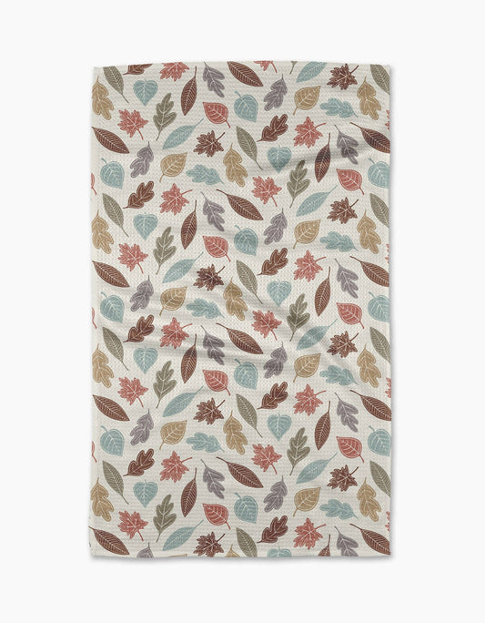 Geometry brand kitchen tea towel with a leaf pattern on a white background