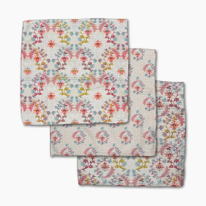 Set of three Geometry dishcloth towels with floral pattern on a white background