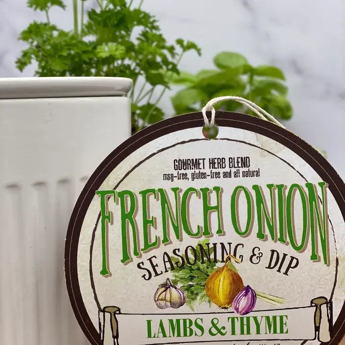 Round seasoning blend label for 'French Onion' with herbs and onions on a white background from Lambs & Thyme
