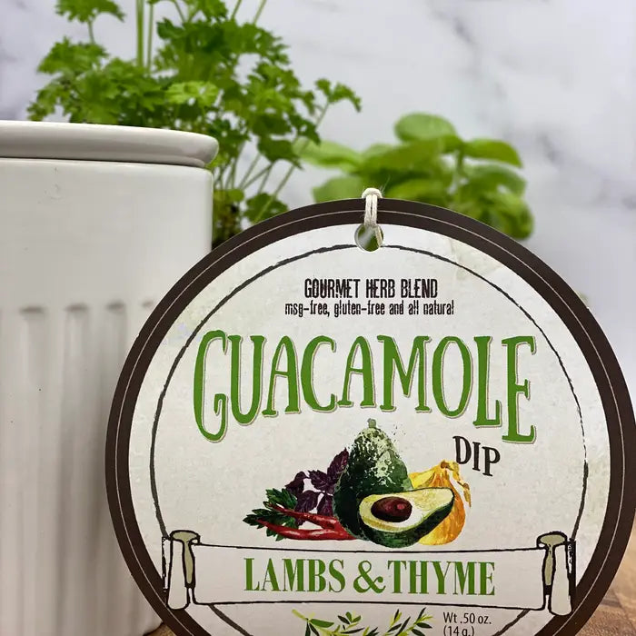 Label for Guacamole Dip by Lambs & Thyme with an avocado and herb illustration on a white background.