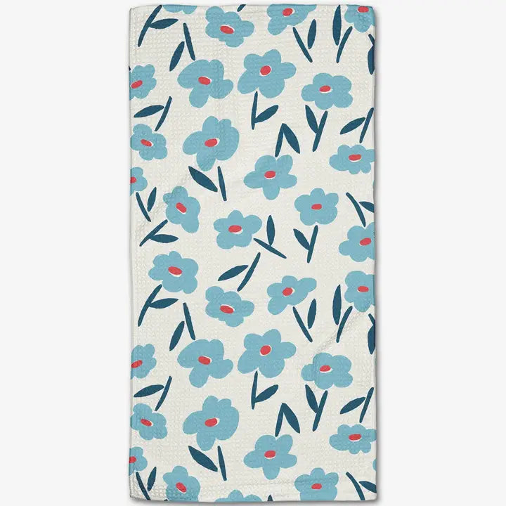 Floral patterned Geometry bar towel with blue flowers and red centers on a white background