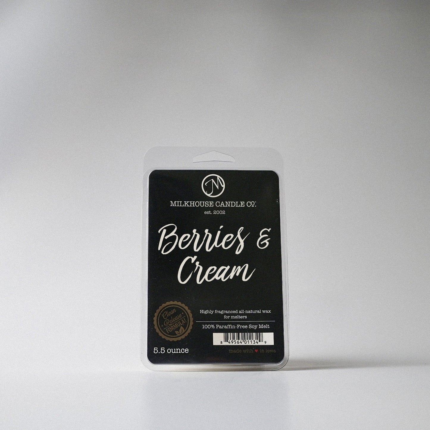 Milkbarn Candle Co. 'Berries & Cream' wax melt package on a gray background