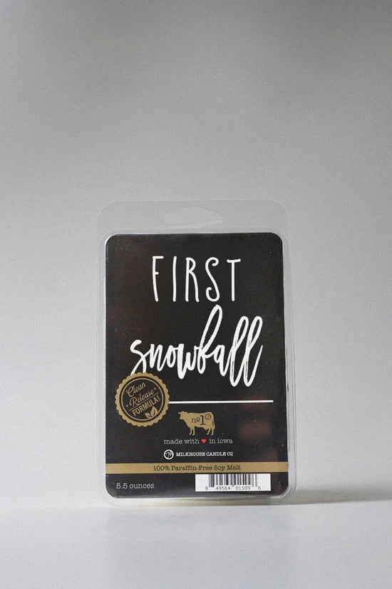 Packaged product labeled 'First Snowfall' on a gray background