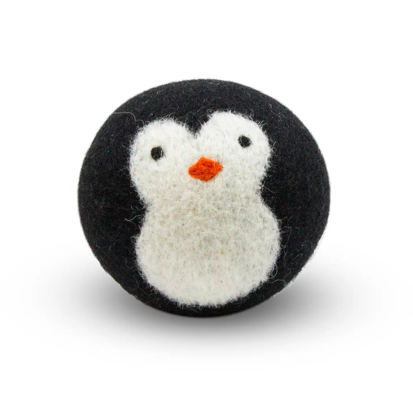 Felted penguin wool dryer ball on a white background