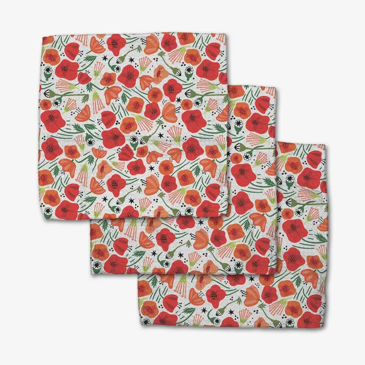 Set of three Geometry dishcloth towels with floral pattern on a white backgroun