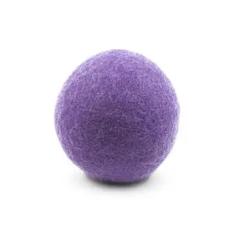 Purple felt wool dryer ball on a white background