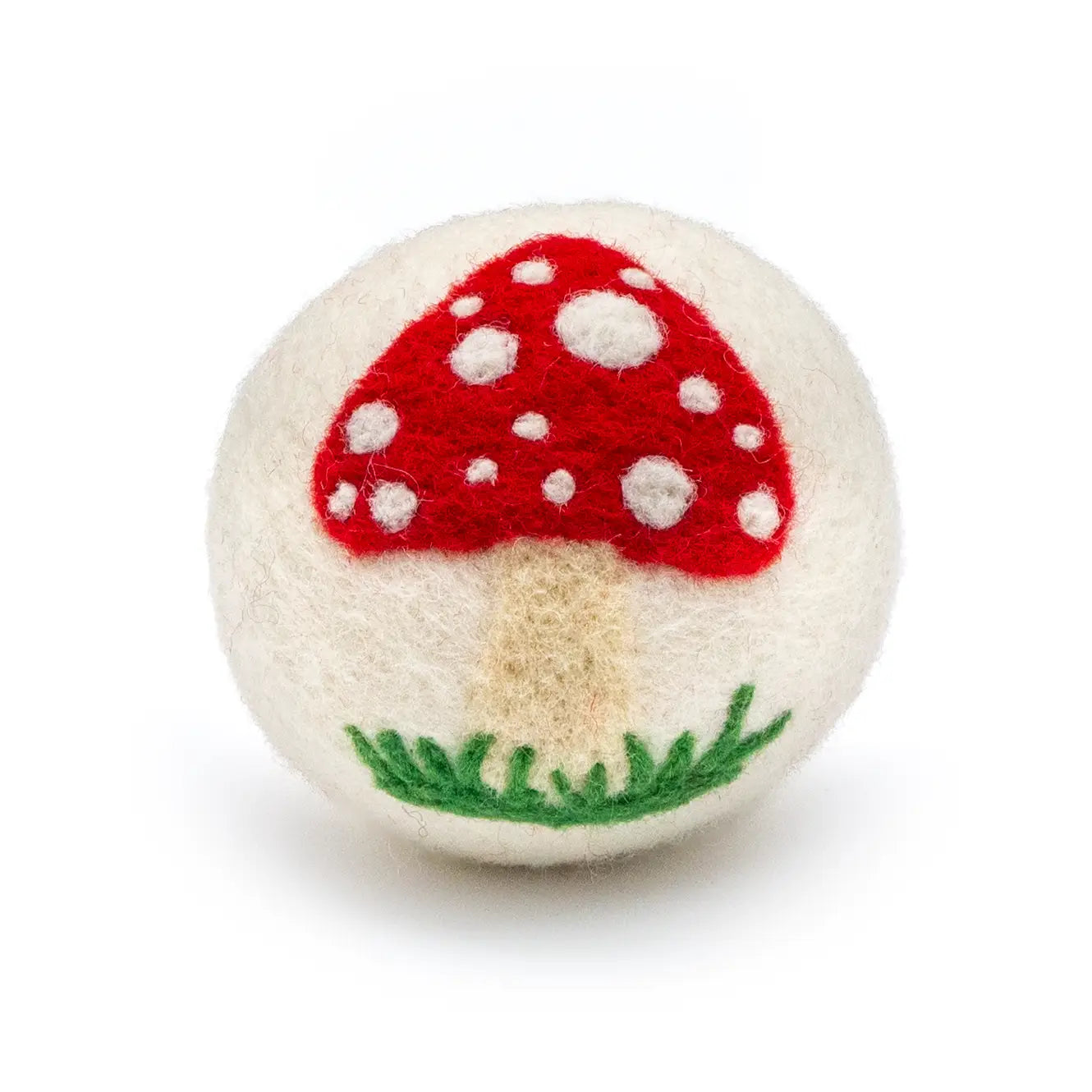 Felted wool dryer ball with a mushroom with red cap and white spots on a white background