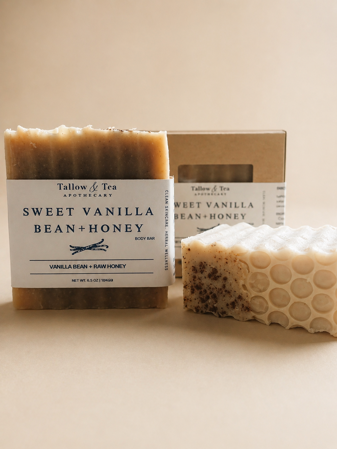 Bar of soap with 'Sweet Vanilla Bean + Honey' label and a honeycomb texture on a beige background.