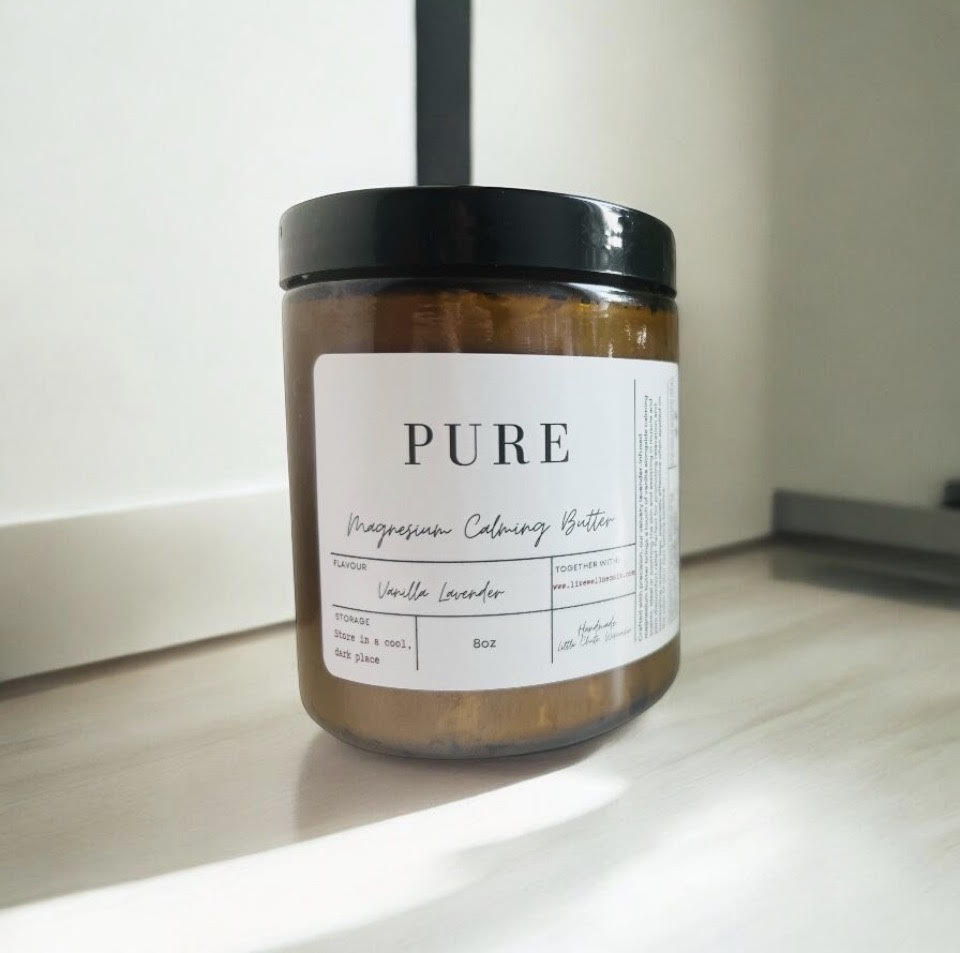 Tallow & Tea Magnesium Calming Butter Jar on counter with beige wall behind