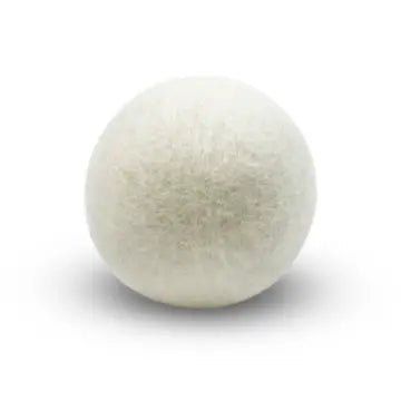 White wool dryer ball on a white background
