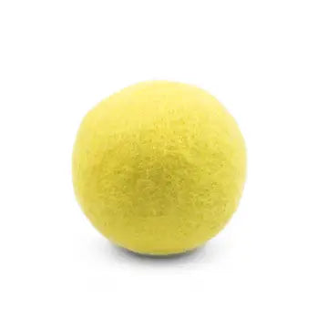 Yellow wool dryer ball on a white background